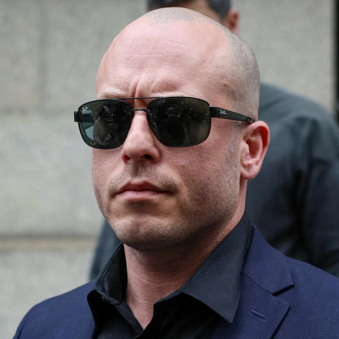 Gannon Van Dyke, a U.S. Army soldier accused of using classified information to place bets on Nicolas Maduro's ouster as Venezuelan president, looks on outside the Manhattan Federal Courthouse following his court appearance, in New York City, U.S., April 28, 2026. REUTERS/Brendan McDermid