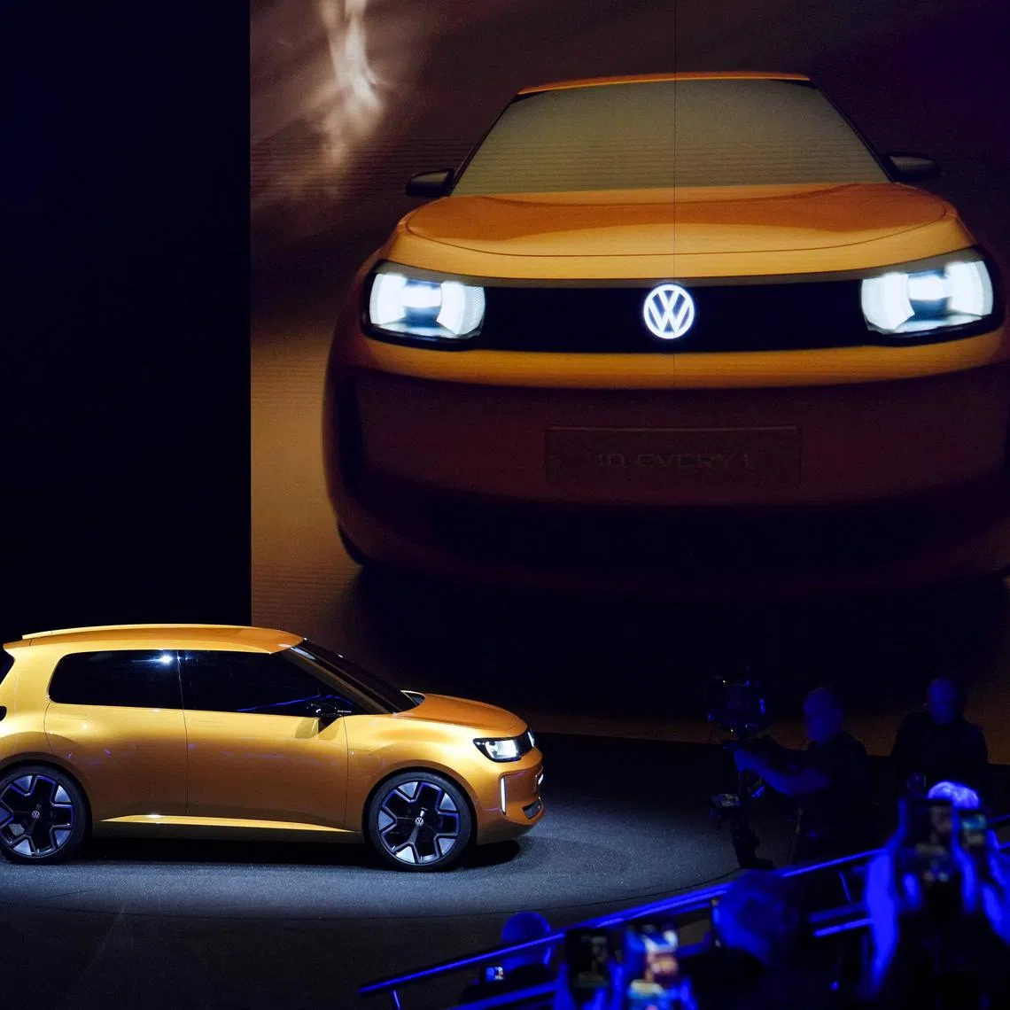 German car manufacturer Volkswagen (VW) presents the new electric vehicle "ID. EVERY1" in Duesseldorf, western Germany on March 5, 2025. (Photo by PAU BARRENA / AFP)