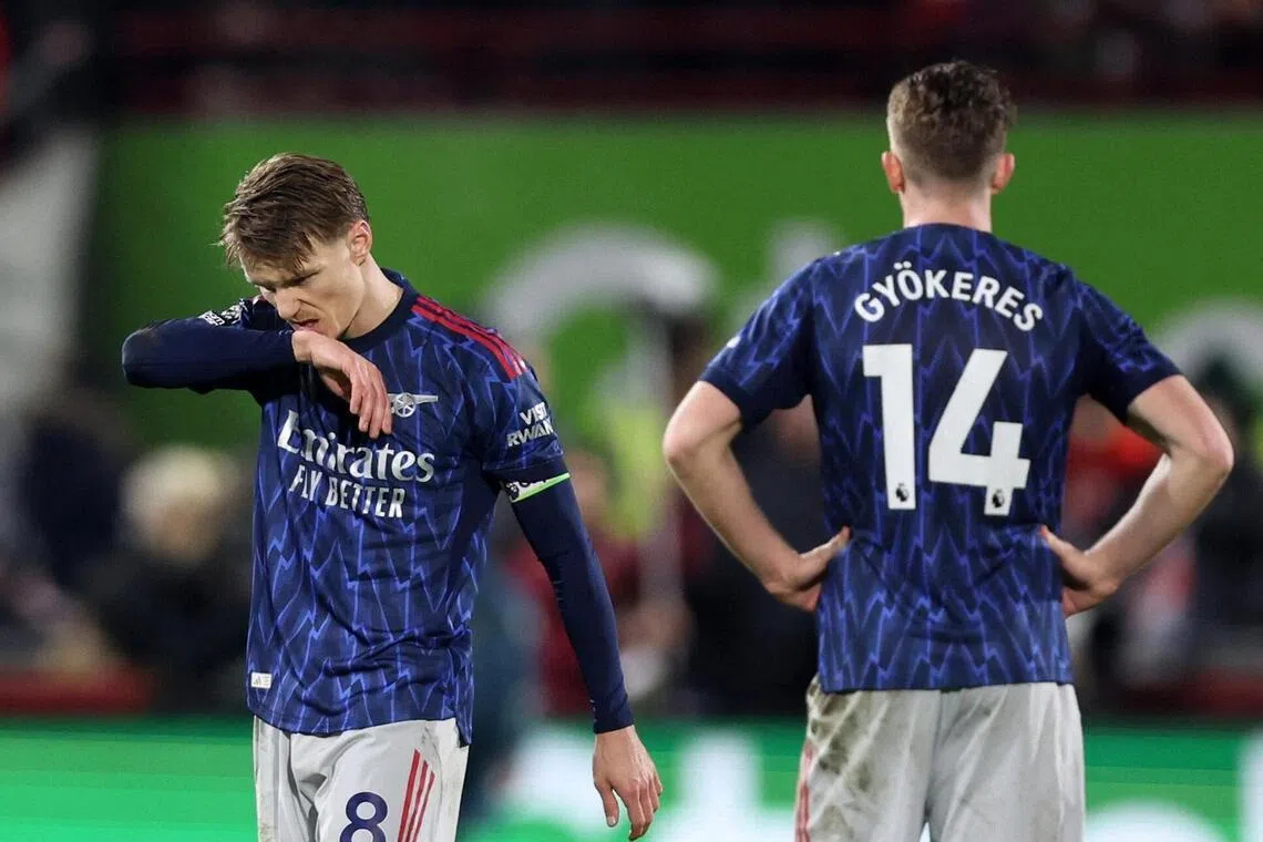 Arsenal's Martin Odegaard looking dejected after their 1-1 draw against Brentford on Feb 12.