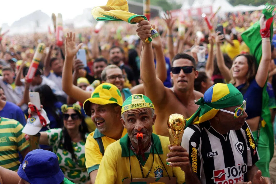 Fans catching the World Cup Group G game between Brazil and Serbia at the Fifa Fan Festival at the Copacabana beach.