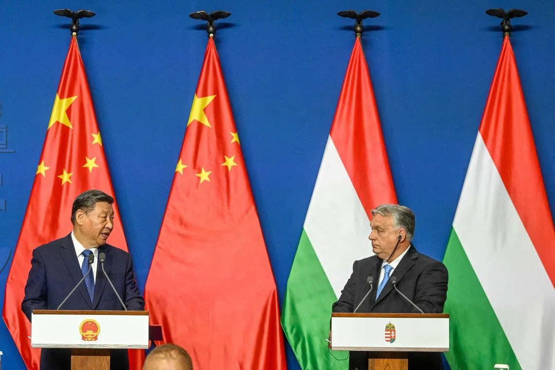 File photo: Hungarian Prime Minister Viktor Orban and Chinese President Xi Jinping hold a joint press conference at the Carmelite Monastery in Budapest, Hungary, May 9, 2024. Szilard Koszticsak/Pool via REUTERS/File photo