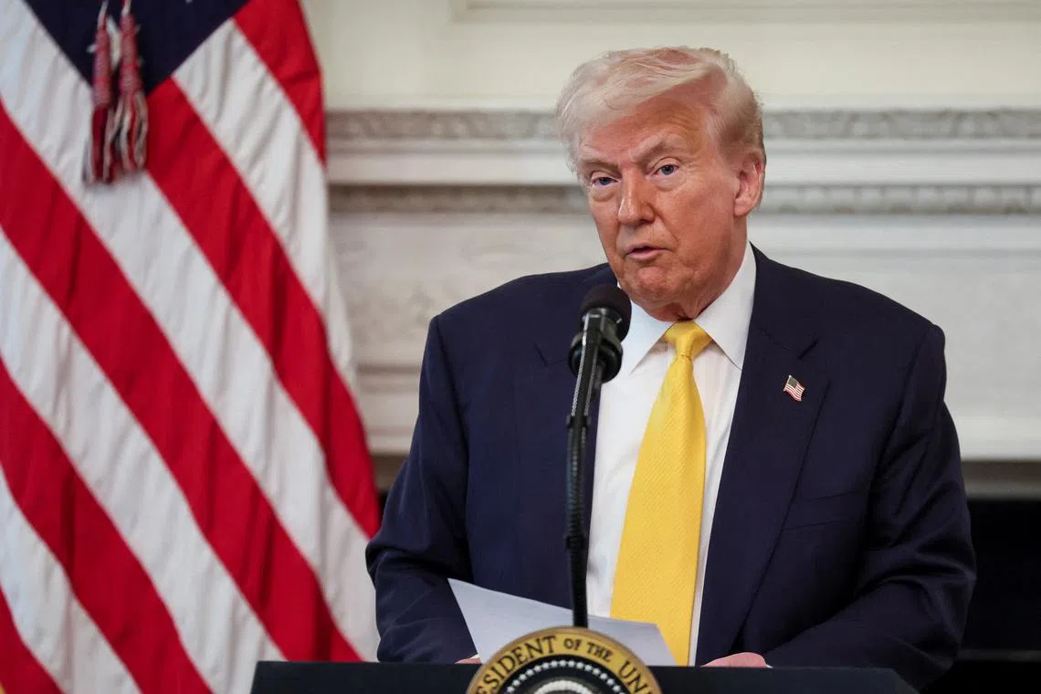 U.S. President Donald Trump hosts a business session with U.S. governors who are in town for the National Governors Association's (NGA) annual winter meeting, at the White House in Washington, D.C., U.S., February 21, 2025. REUTERS/Leah Millis