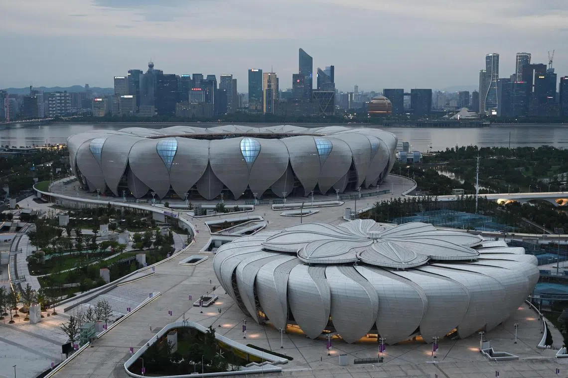 This picture shows the Hangzhou Olympic Sports Center Stadium (back) and Tennis Centre which will host competition at the Asian Games in Hangzhou, in China’s eastern Zhejiang province. Up to 500 Russian and Belarusian athletes will be allowed to compete as neutrals at the Games.