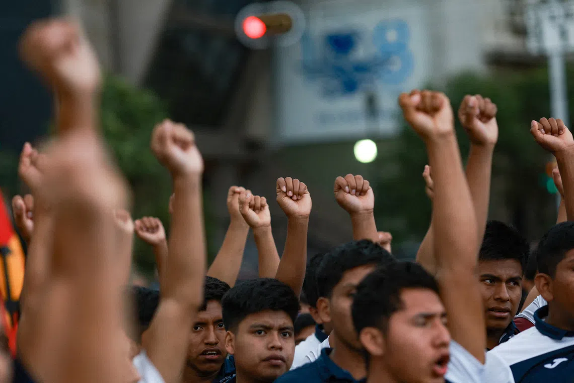 Students of the Ayotzinapa Rural Teachers' College take part in a march to demand justice in the 2014 disappearance of 43 students of Ayotzinapa Rural Teachers' College, in Mexico City, Mexico, June 26, 2025. REUTERS/Henry Romero