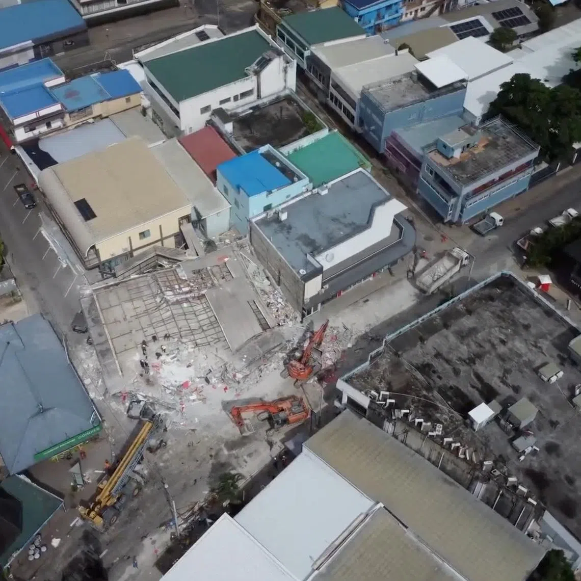 A drone view shows a collapsed building in the aftermath of a strong earthquake in Port Vila, Vanuatu, December 18, 2024, in this screengrab taken from a social media video. Jeremy Ellison/via REUTERS/File photo