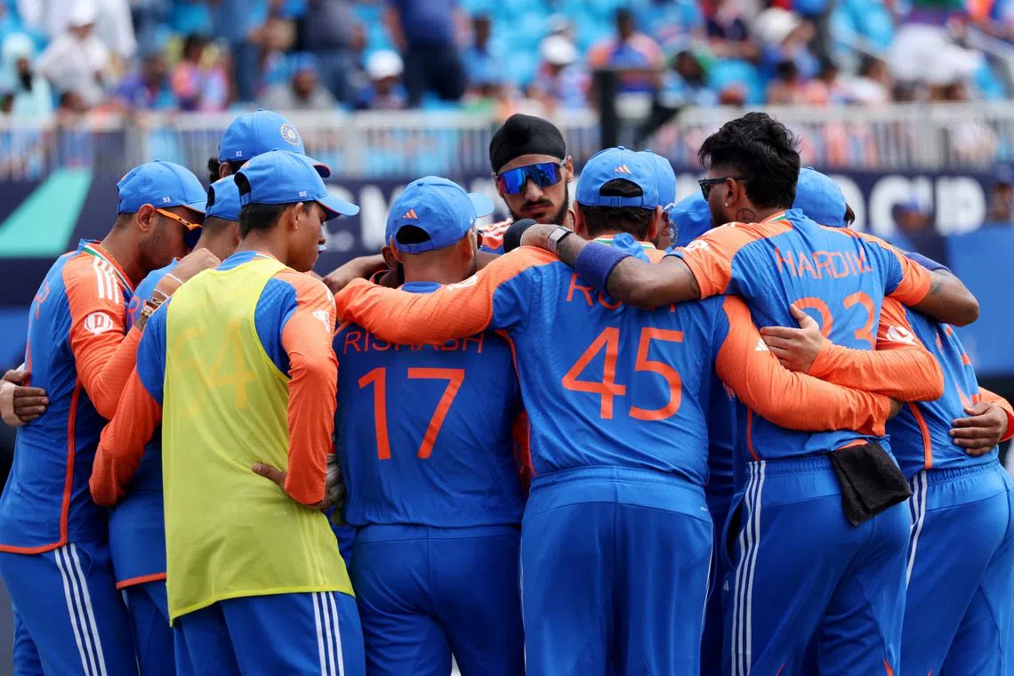 FILE PHOTO: Cricket - ICC T20 World Cup 2024 - Group A - India v Pakistan - Nassau County International Cricket Stadium, New York, United States - June 9, 2024 India players huddle together before going in to field REUTERS/Andrew Kelly/File Photo
