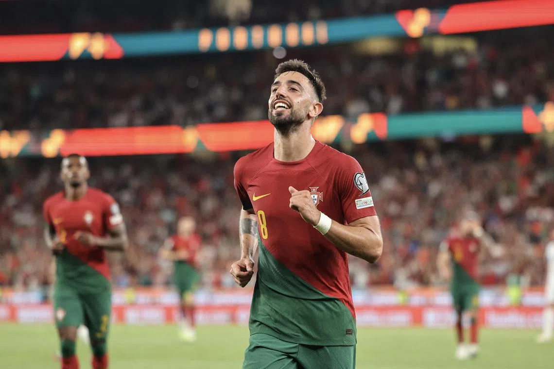 Portugal's Bruno Fernandes celebrates scoring his second goal.