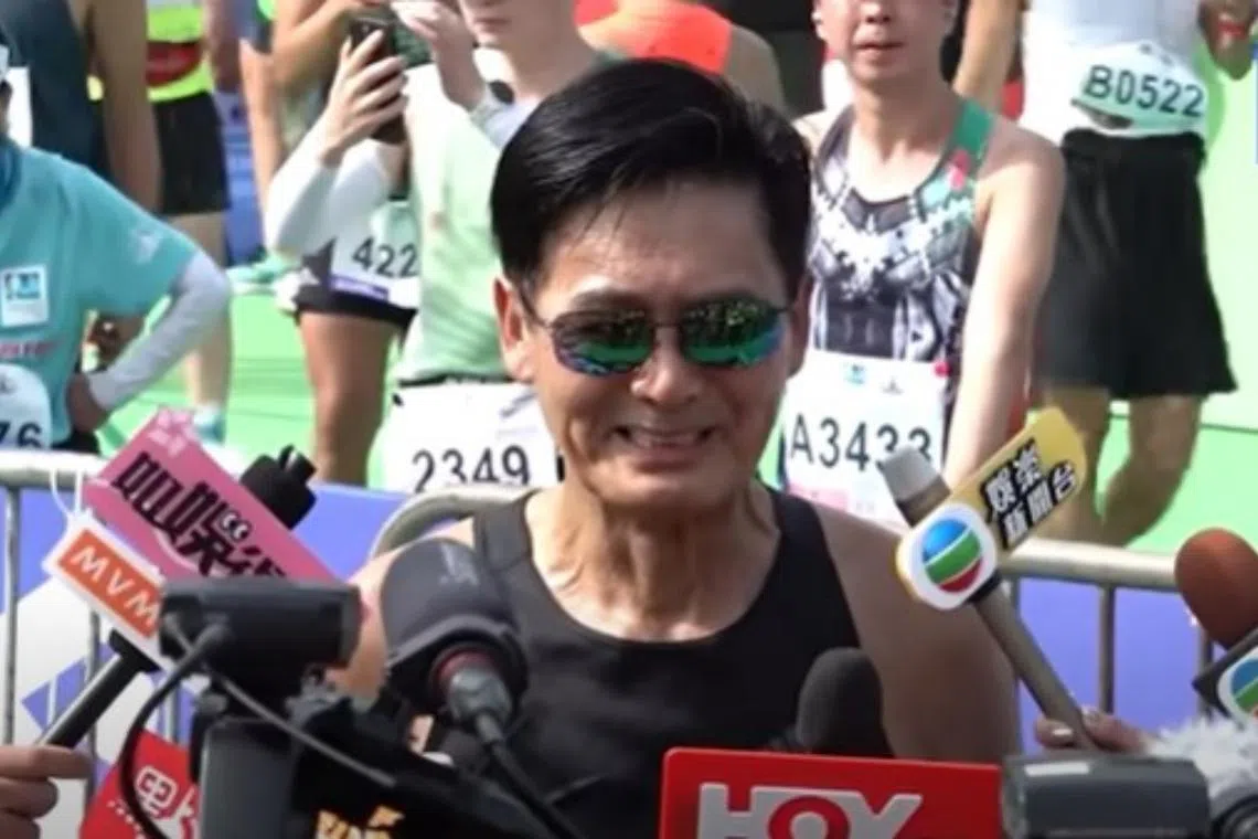 Chow Yun Fat spoke to the media after the Standard Chartered Hong Kong Marathon. 