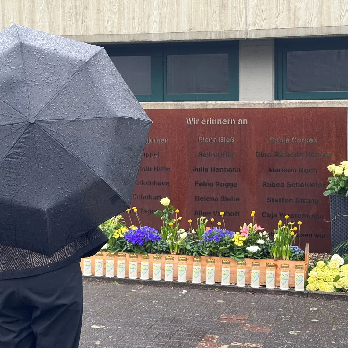 Sylvia Loehrmann, former school and culture minister of the federal state of North Rhine-Westphalia, pays respect to the victims of the Germanwings 4U9525 plane crash, at the Joseph-Koenig Gymnasium during the 10th anniversary of the crash in Haltern am See, Germany, March 24, 2025. REUTERS/Stephan Nitschke