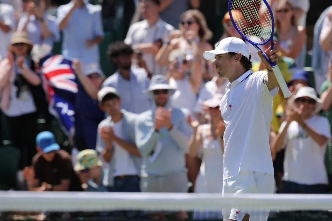 Tennis - Wimbledon - All England Lawn Tennis and Croquet Club, London, Britain - July 2, 2026 Australia's Alex de Minaur celebrates after winning his second round match against France's Adrian Mannarino REUTERS/Marko Djurica