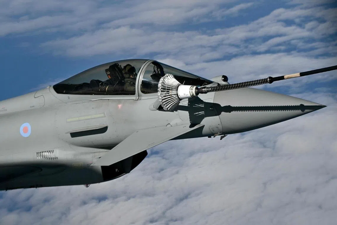 A Royal Air Force Eurofighter Typhoon refuels during a Nato exercise. The jets were dispatched from RAF Lossiemouth.