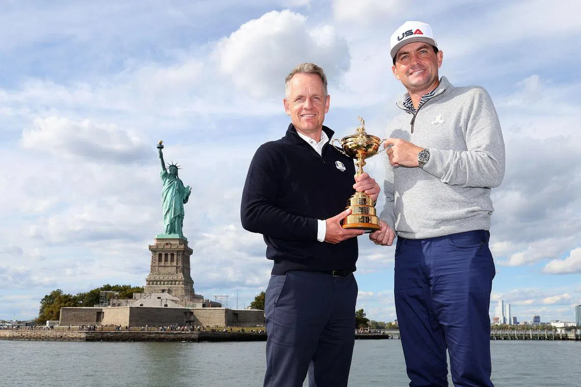 Team Captains Luke Donald of England and Keegan Bradley of The United States pose for a photograph with the Ryder Cup Trophy during the Ryder Cup 2024 Year to Go Media Event at the Statue of Liberty on Oct 8, 2024.