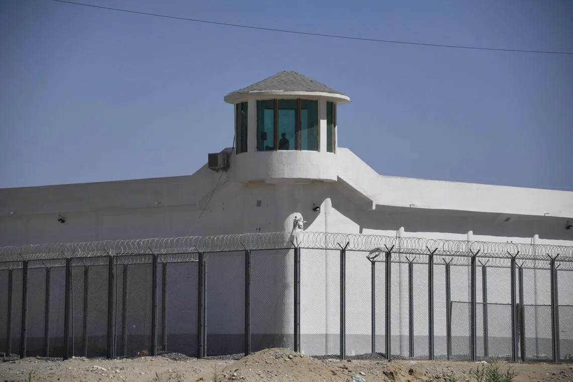 A 2019 photo shows a watchtower at a high-security facility near what is believed to be a re-education camp where mostly Muslim ethnic minorities are detained, on the outskirts of Hotan, in China's northwestern Xinjiang region.