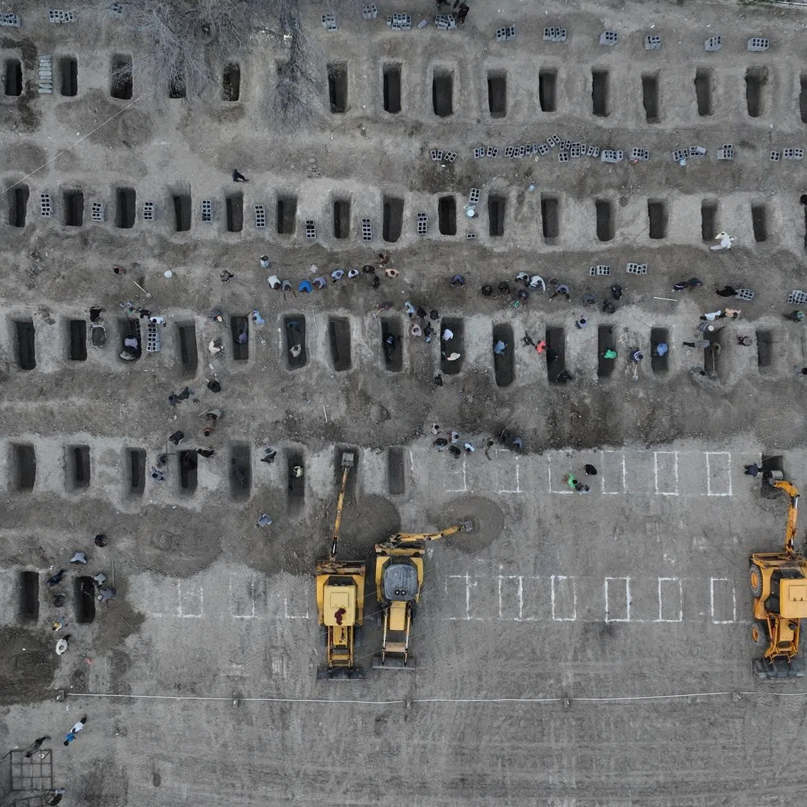 Graves are being prepared for the victims following a reported strike on a school in Minab, Iran, March 2, 2026. Iranian Foreign Media Department/WANA (West Asia News Agency)/Handout via REUTERS