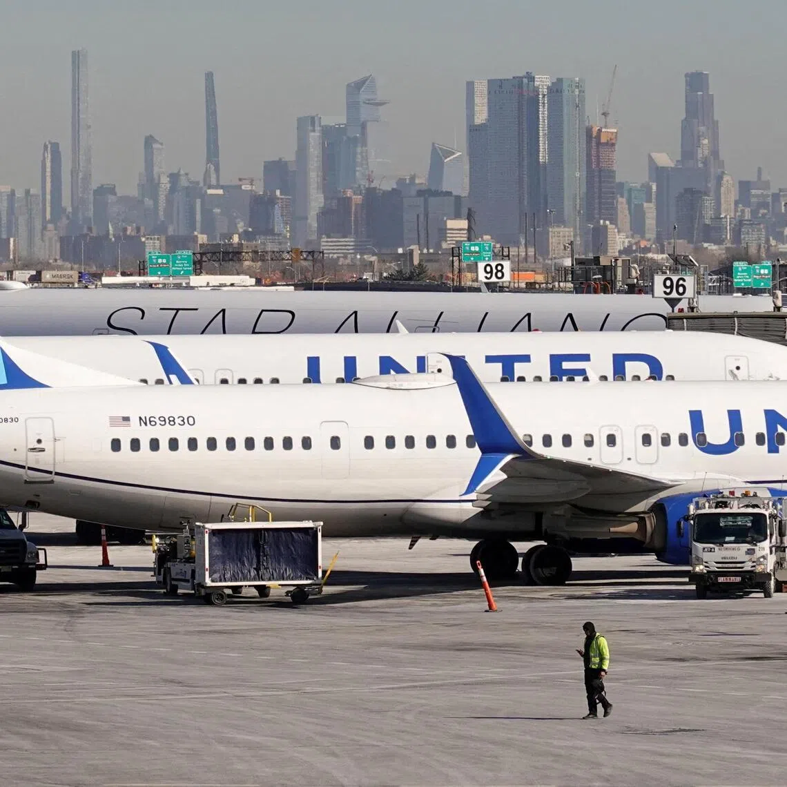 The pilot said he had heard a thump just before landing, but did not realise the plane had clipped a light pole that crashed into a trailer.