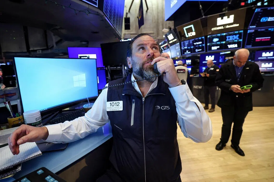Traders working on the floor of the New York Stock Exchange, in New York City, on Feb 11.