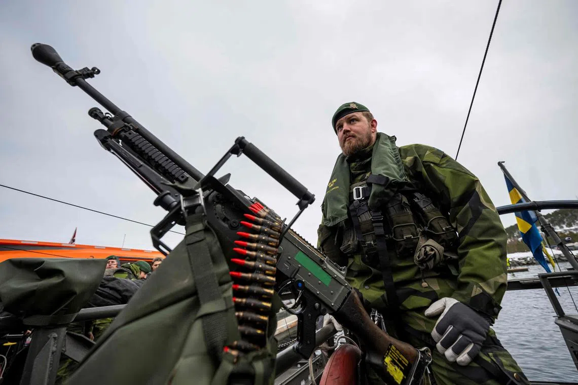 A Swedish Marine taking part in Nato's Nordic Response military exercise - part of the defence alliance's larger Steadfast Defender exercise - on March 8, 2024, in Alta, above the Arctic Circle in Norway.