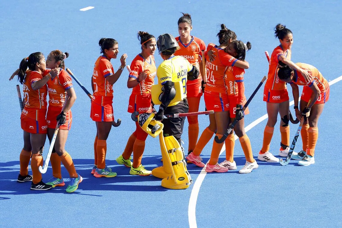 India’s team in their orange kits during the 2026 FIH Women’s Hockey World Cup in the Netherlands on Aug 20.