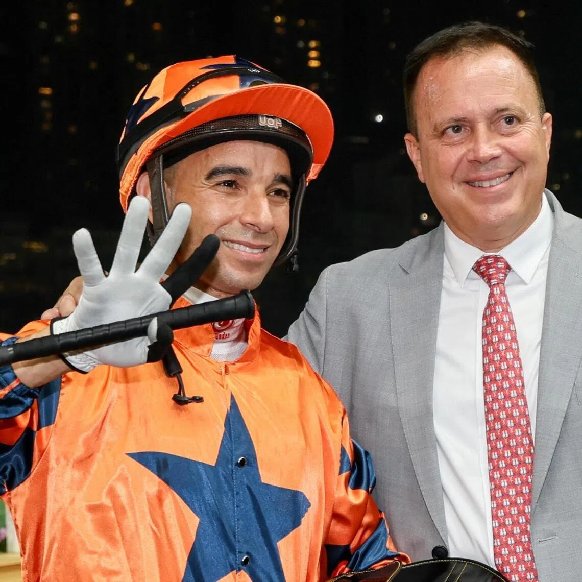 Joao Moreira and Caspar Fownes celebrating their four-timer at Happy Valley on April 8.  

