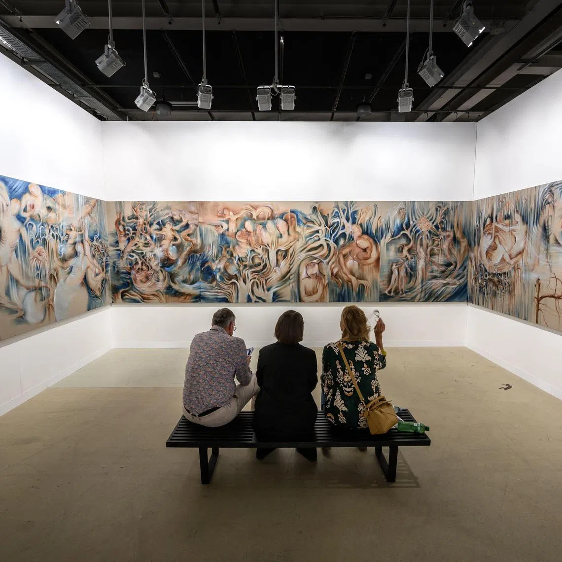 A work by Ukrainian painter Sana Shahmuradova Tanska entlited "Zhai-Liza (angel), 2024" is on display at the booth of Gunia Nowik Gallery during the Art Basel fair for Modern and contemporary art, in Basel, on June 17, 2025. The fair will open to the public from June 19 to June 22, 2025, featuring over 290 leading galleries and more than 4,000 artists from five continents. (Photo by Fabrice COFFRINI / AFP) / RESTRICTED TO EDITORIAL USE - MANDATORY MENTION OF THE ARTIST UPON PUBLICATION - TO ILLUSTRATE THE EVENT AS SPECIFIED IN THE CAPTION