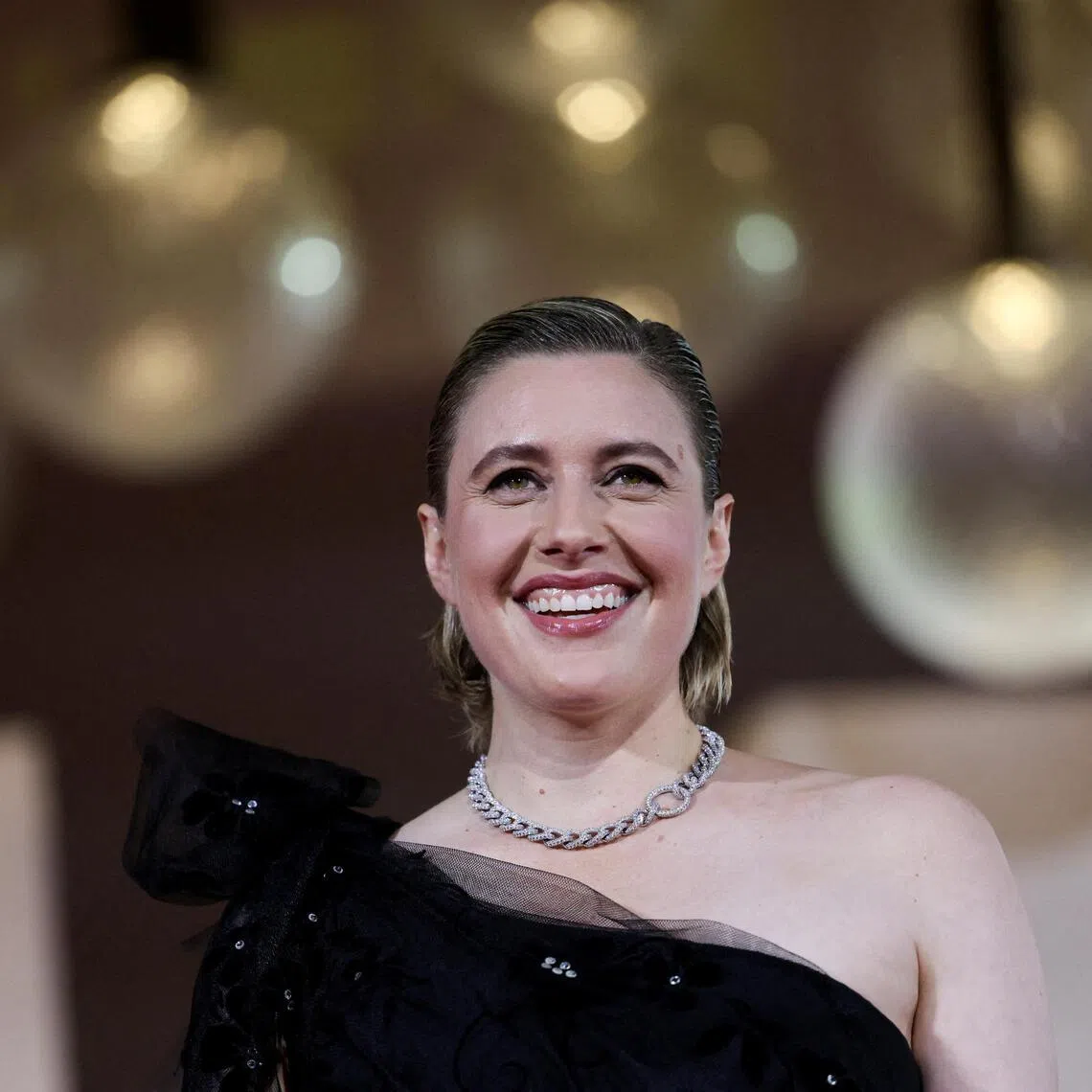 Greta Gerwig at the screening of the movie Jay Kelly at the Venice Film Festival in Italy on Aug 28, 2025. 