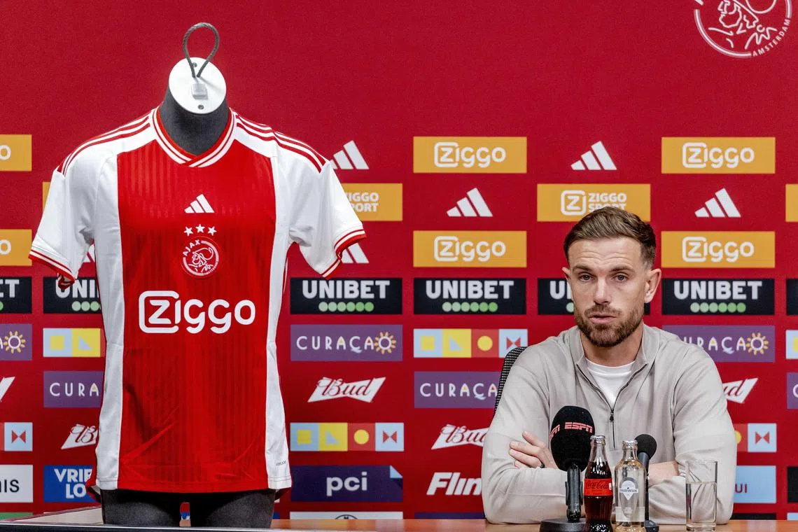 English midfielder Jordan Henderson is presented at a press conference after joining Ajax Amsterdam.