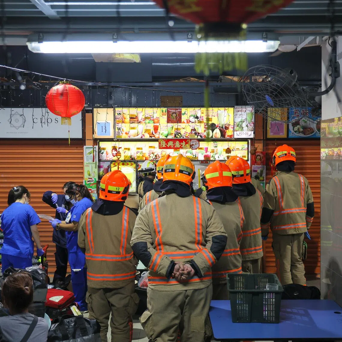 The stall owner’s hand was freed from the machine at around 10.45pm, and his ring and pinkie fingers were bandaged as he was helped onto a stretcher.