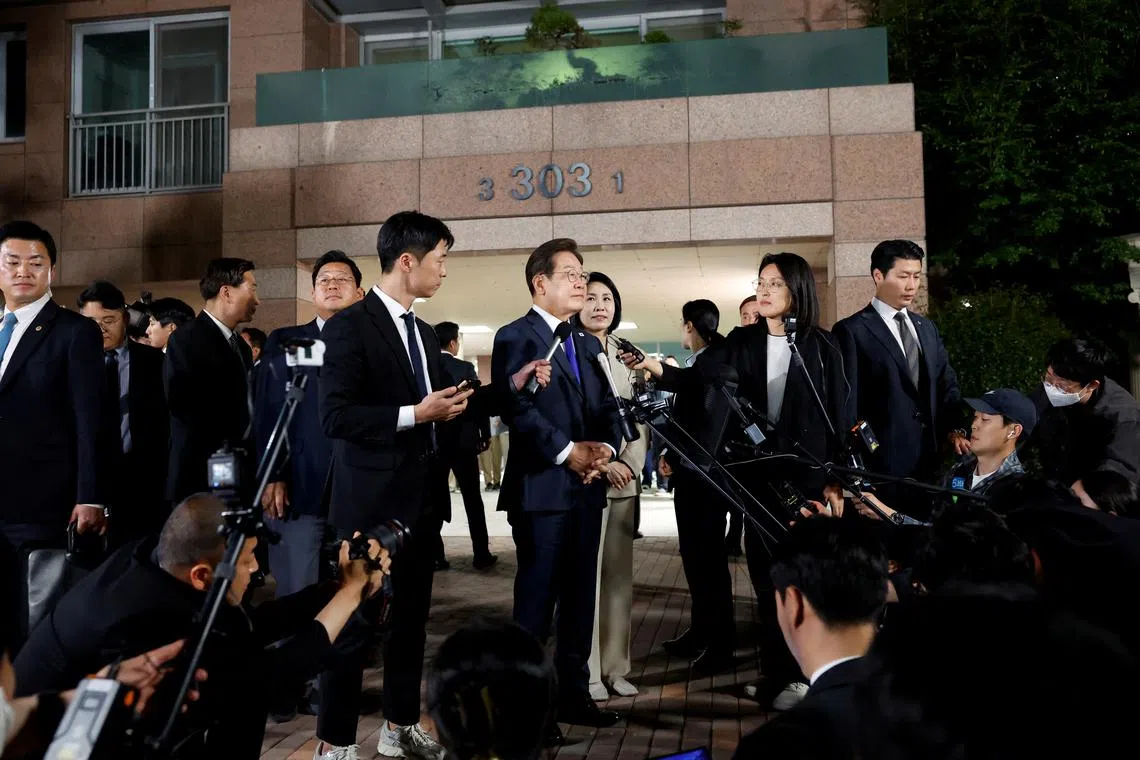 Lee Jae-myung, the presidential candidate for South Korea's Democratic Party, speaks as he leaves to meet his supporters, in Incheon, South Korea, June 3, 2025. REUTERS/Kim Soo-hyeon