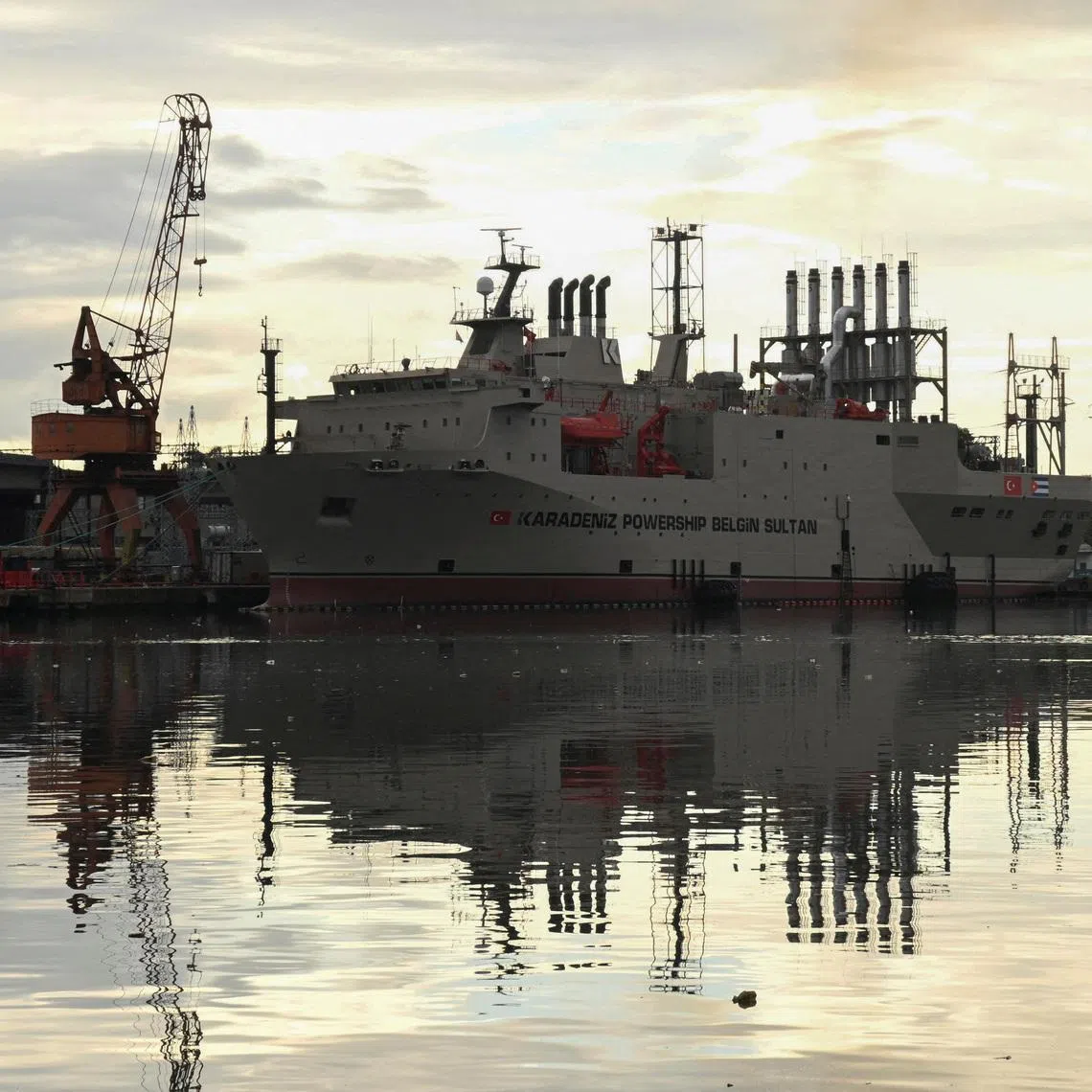 FILE PHOTO: A floating power plant is docked on Havana Bay, after U.S. President Donald Trump vowed to stop Venezuelan oil and money from reaching the island as Cubans brace for worsening fuel shortages amid regular power outages, in Havana, Cuba January 12, 2026. REUTERS/Norlys Perez/File Photo