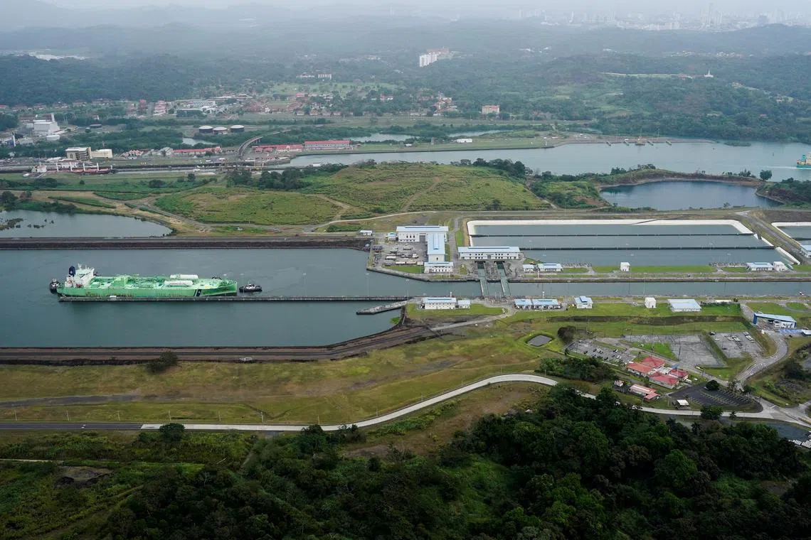 FILE PHOTO: An aerial view shows a cargo vessel transits through the Agua Clara Locks at the Panama Canal, in Colon, Panama, February 1, 2025. REUTERS/Enea Lebrun/File Photo
