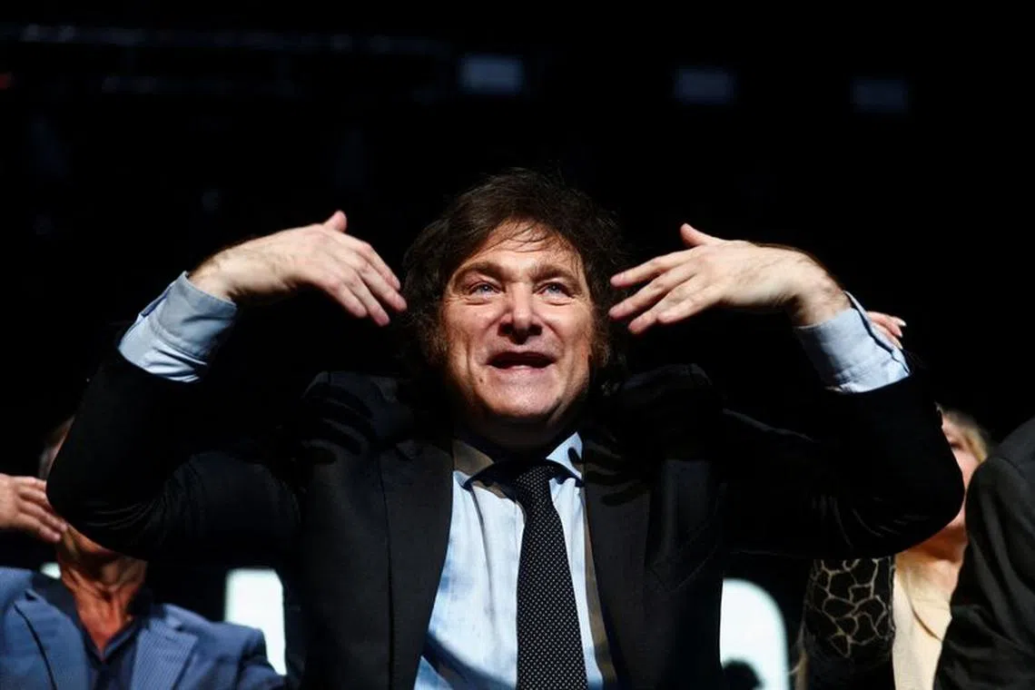 FILE PHOTO: Argentine presidential candidate Javier Milei of La Libertad Avanza party reacts during the closing event of his electoral campaign ahead of the presidential election, in Buenos Aires, Argentina, October 18, 2023. REUTERS/Matias Baglietto/File Photo