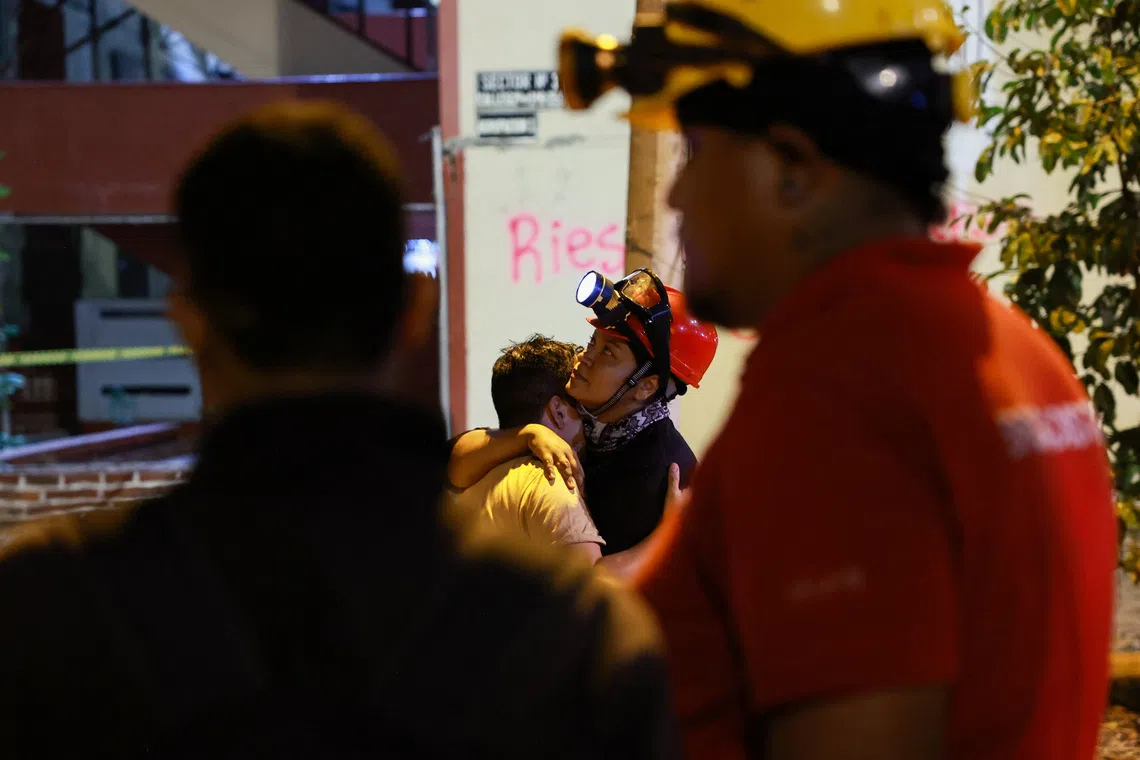Race to reach trapped survivor offers hope in Colombia quake zone