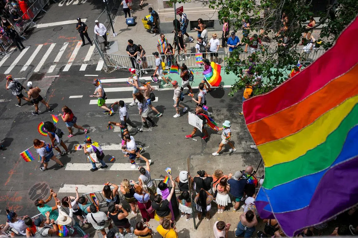 People participate in the 2025 NYC Pride March in Manhattan, New York City, U.S., June 29, 2025. REUTERS/Angelina Katsanis