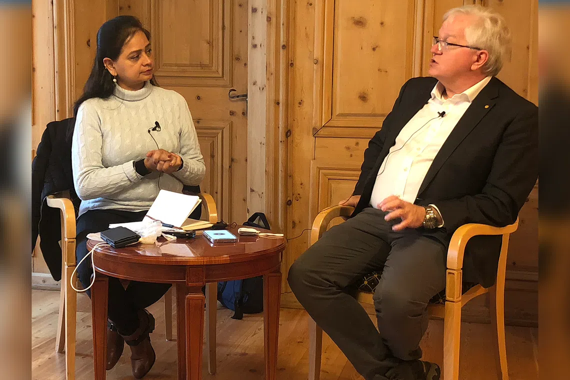 (From left) ST’s Asia News Network editor Shefali Rekhi speaks with Australian National University’s vice-chancellor Brian Schmidt at the World Economic Forum’s annual meeting 2023 in Davos. 