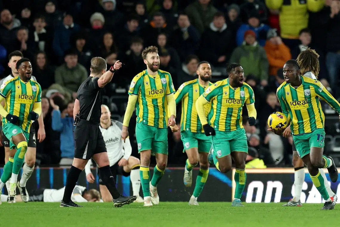 FILE PHOTO: Soccer Football - Championship - Derby County v West Bromwich Albion - Pride Park, Derby, Britain - January 23, 2026 West Bromwich Albion players celebrate after Chris Mepham scores their first goal Action Images/Andrew Boyers/File Photo
