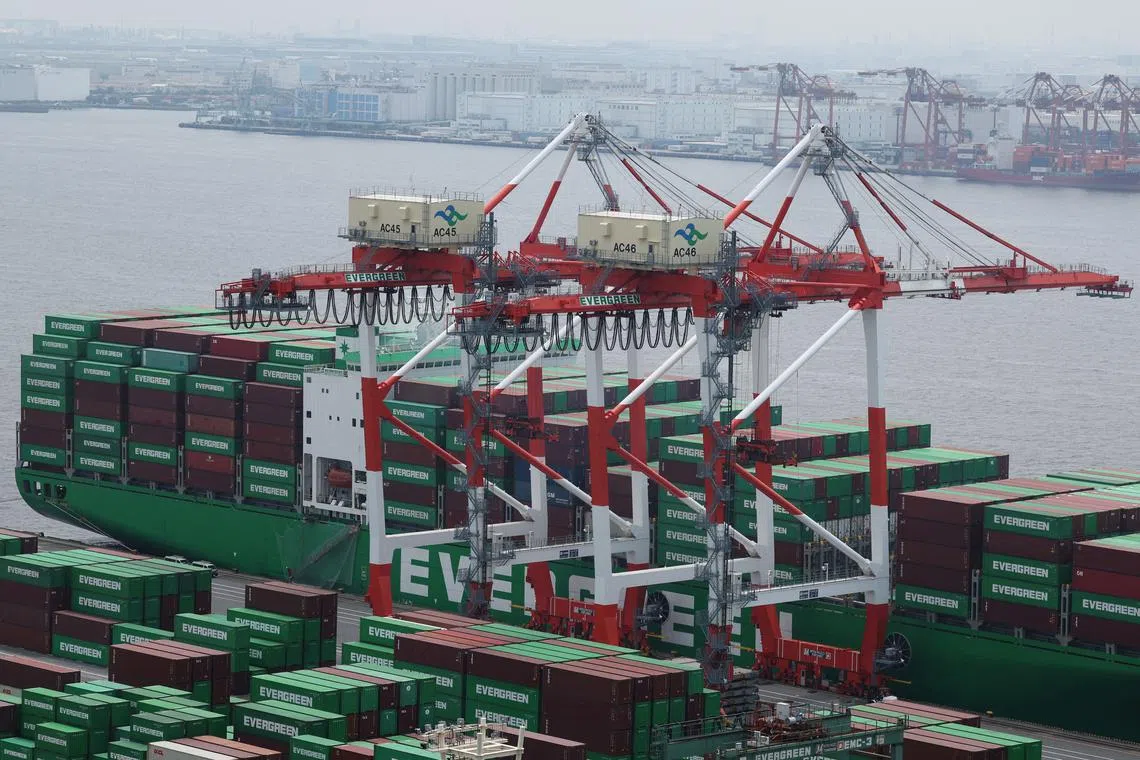 FILE PHOTO: Containers on a cargo ship are pictured at an industrial port in Tokyo, Japan, July 2, 2025.   REUTERS/Kim Kyung-Hoon/File Photo