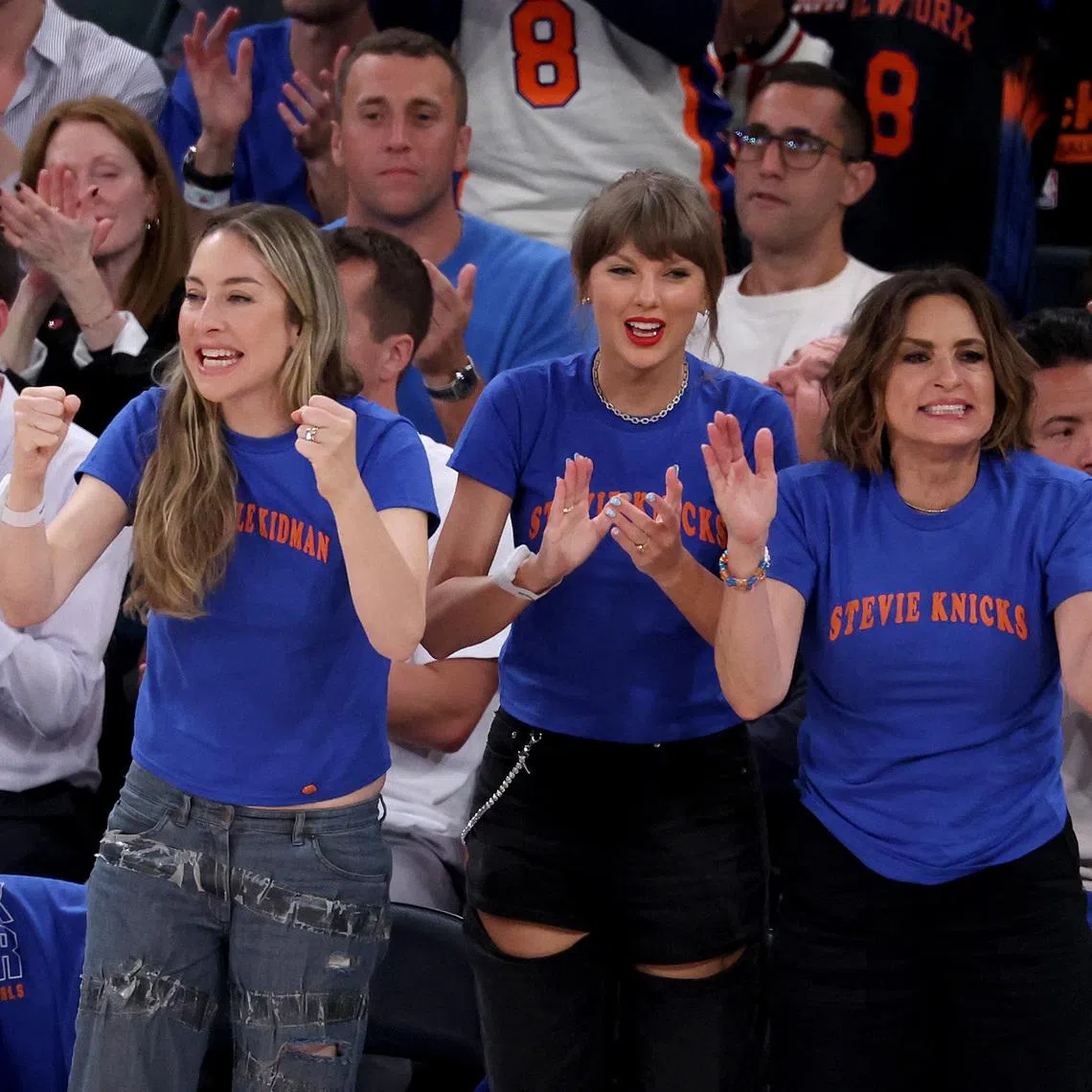Singer Taylor Swift (centre) and musicians Alana and Este Haim attends Game Three between the New York Knicks and the Cleveland Cavaliers in the NBA Eastern Conference Finals at Rocket Arena on May 23.