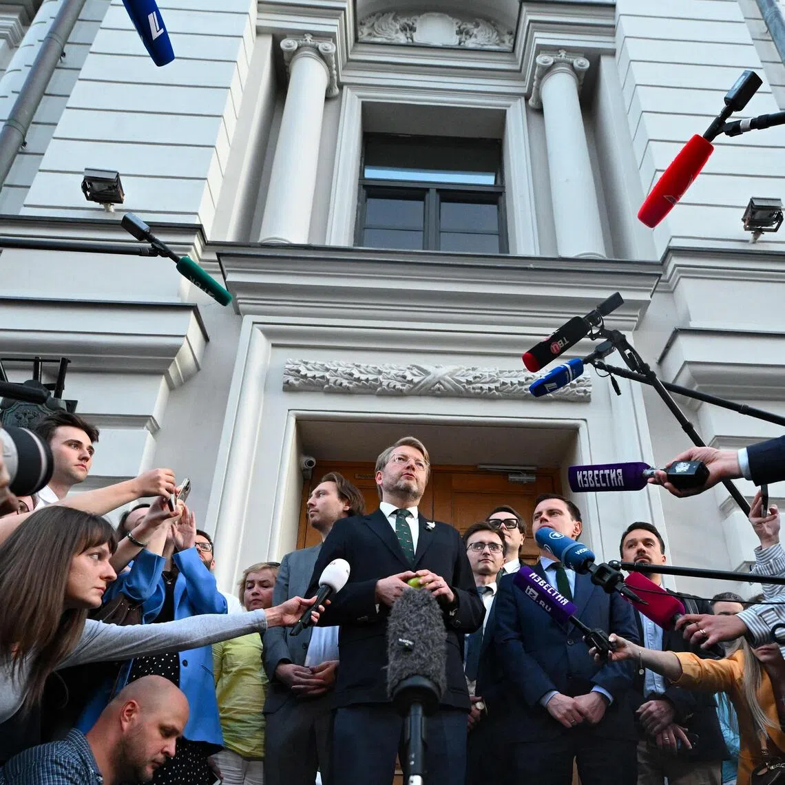 abloko party leader Nikolay Rybakov talking to the media in Moscow on Aug 10, after his party was barred from taking part in Russia’s September election.