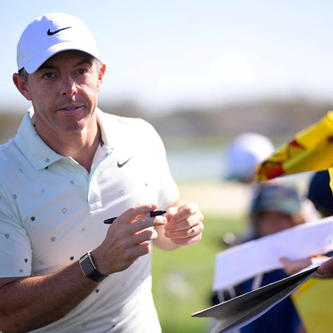 Rory McIlroy of Northern Ireland signs autographs for fans prior to the Arnold Palmer Invitational.