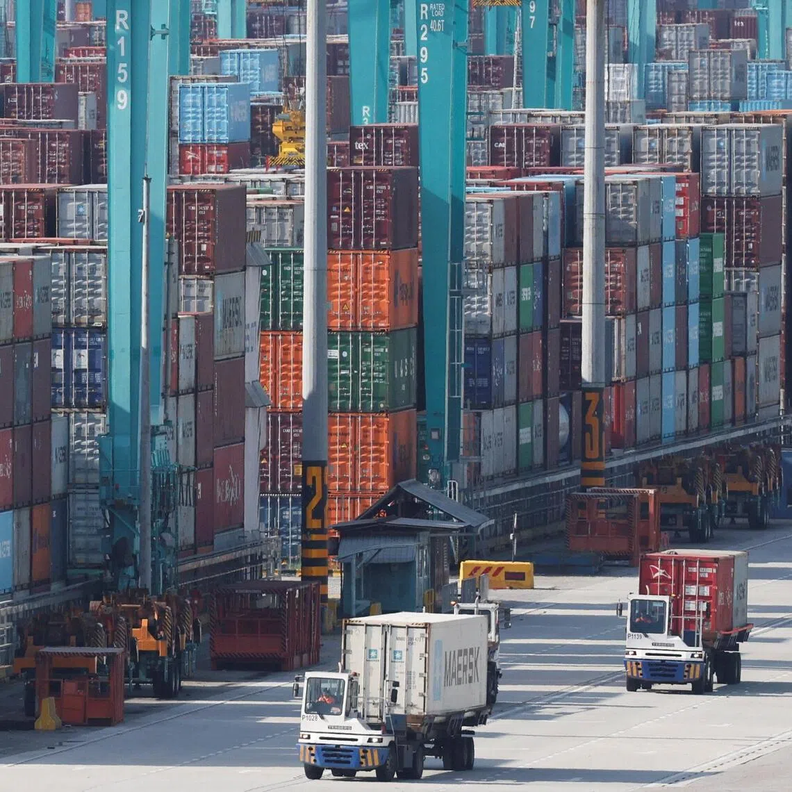 Trucks transport shipping containers at Tanjung Pelepas Port in Gelang Patah, Malaysia, June 29, 2026. REUTERS/Hasnoor Hussain
