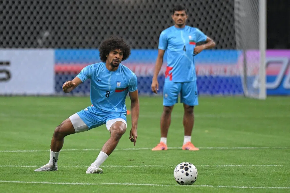Bangladesh footballer Hamza Choudhury (left) in action during a training session ahead of the Asian Cup qualifier against Singapore on March 31, 2026.