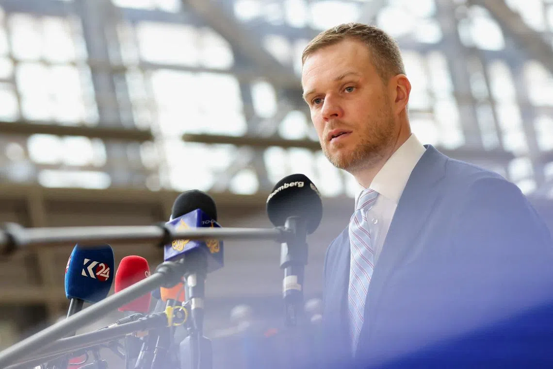 Lithuanian Foreign Minister Gabrielius Landsbergis speaks to members of the media as he attends a European Union Foreign Ministers' meeting in Brussels, Belgium March 18, 2024. REUTERS/Johanna Geron/File Photo
