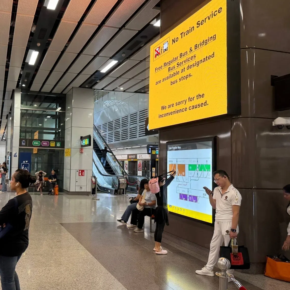 A notice informs commuters of a Thomson-East Coast Line service disruption at Outram Park TEL station on May 3.