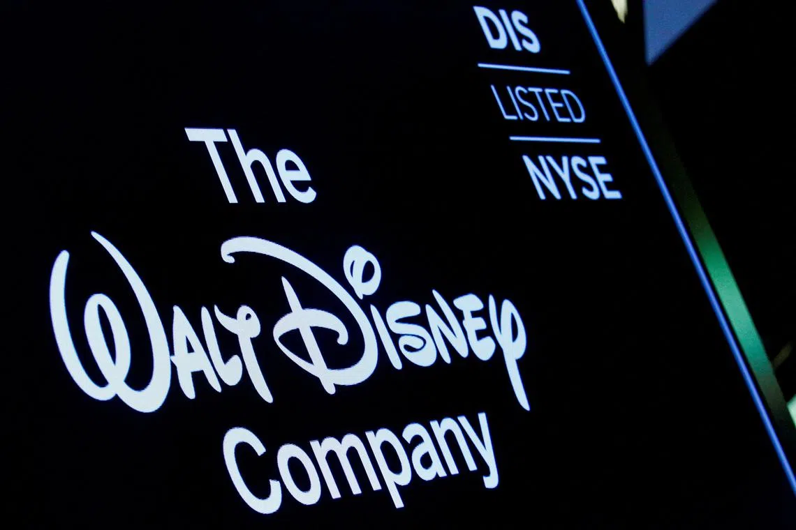 FILE PHOTO: A screen shows the logo and a ticker symbol for The Walt Disney Company on the floor of the New York Stock Exchange (NYSE) in New York, U.S., December 14, 2017. REUTERS/Brendan McDermid/File Photo