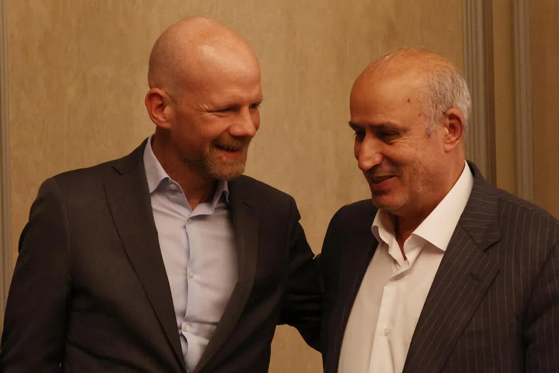 Iran FA president Mehdi Taj (right) meeting FIFA secretary general Mattias Grafstrom in Istanbul on May 16.