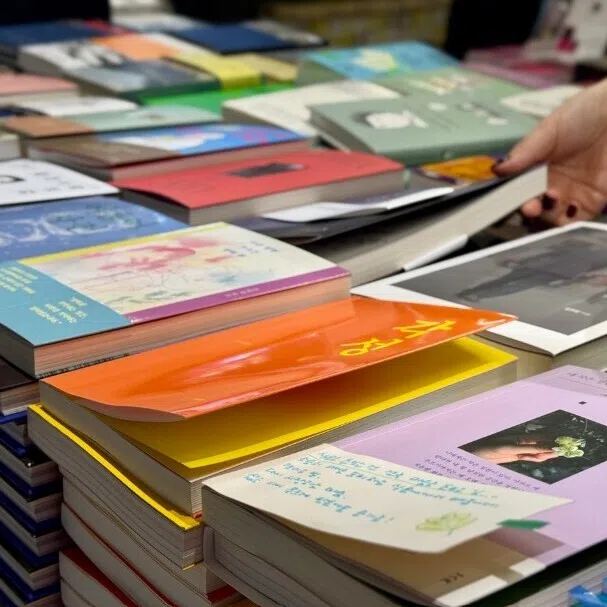 Customers browse the essay best section at Kyobo Book Center in Gwanghwamun, central Seoul.