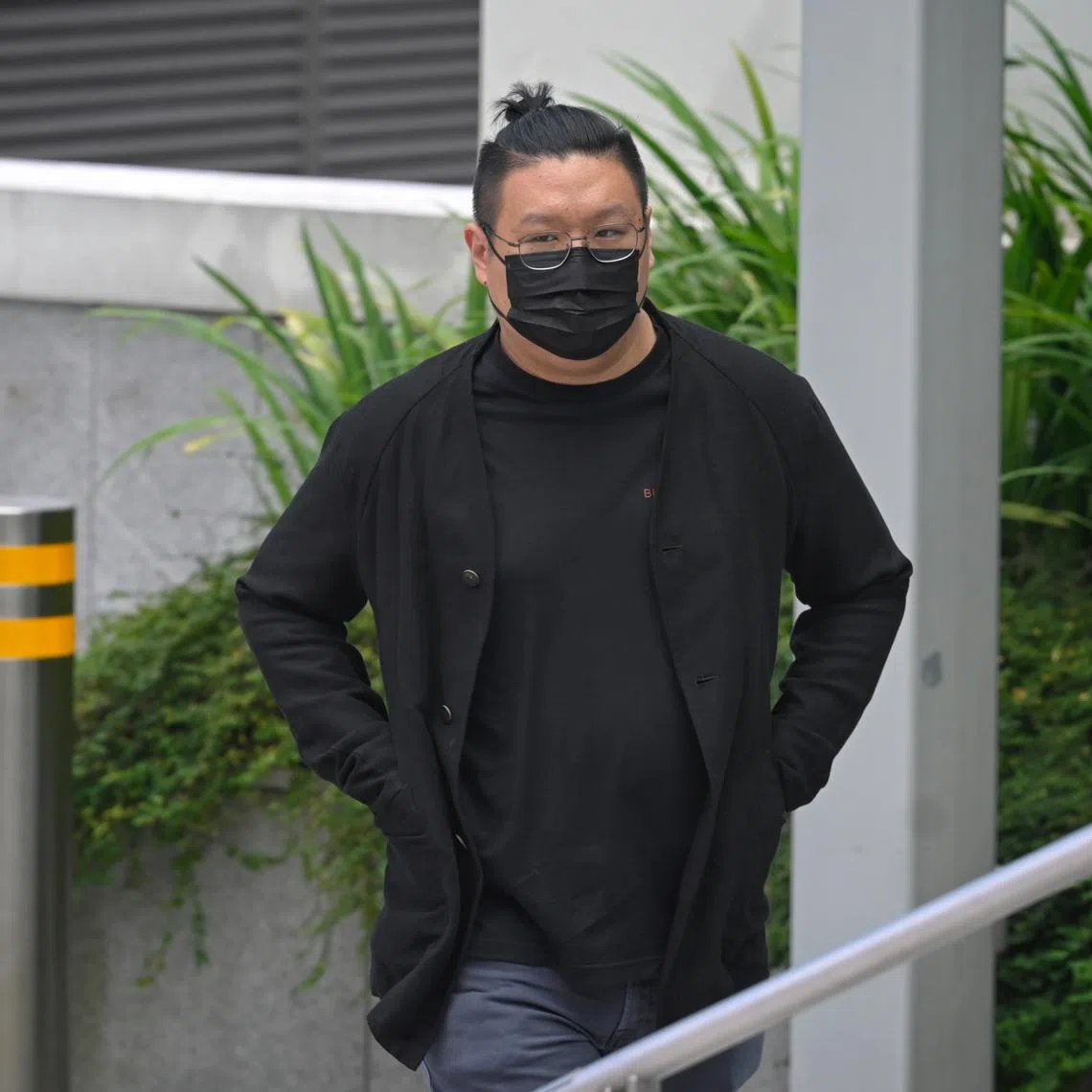 Ng Yu Zhi, the alleged perpetrator of a US$1.1 billion nickel trading scam, arrives at the State Courts on January 17, 2023. The founder of Envy Global Trading and Envy Asset Management was made a bankrupt in December 2022. He was arrested in February 2021 and charged with cheating and fraudulent trading.