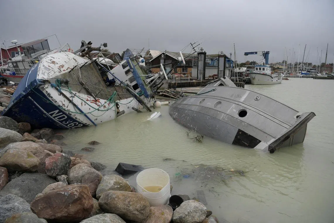 A view of damaged boats in the aftermath of severe weather in Roedvig, Denmark.