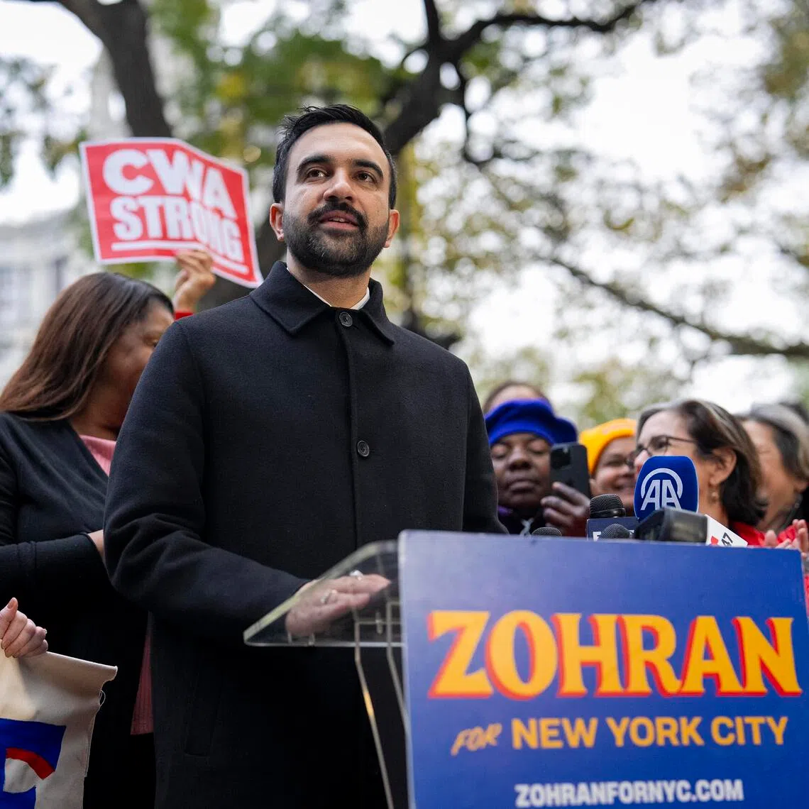Mr Zohran Mamdani, the mayor-elect of New York City, speaking at a press conference in City Hall Park on Nov 3. When he takes office on Jan. 1, he will seek to move quickly to implement his affordability plans and respond to threats from President Donald Trump.