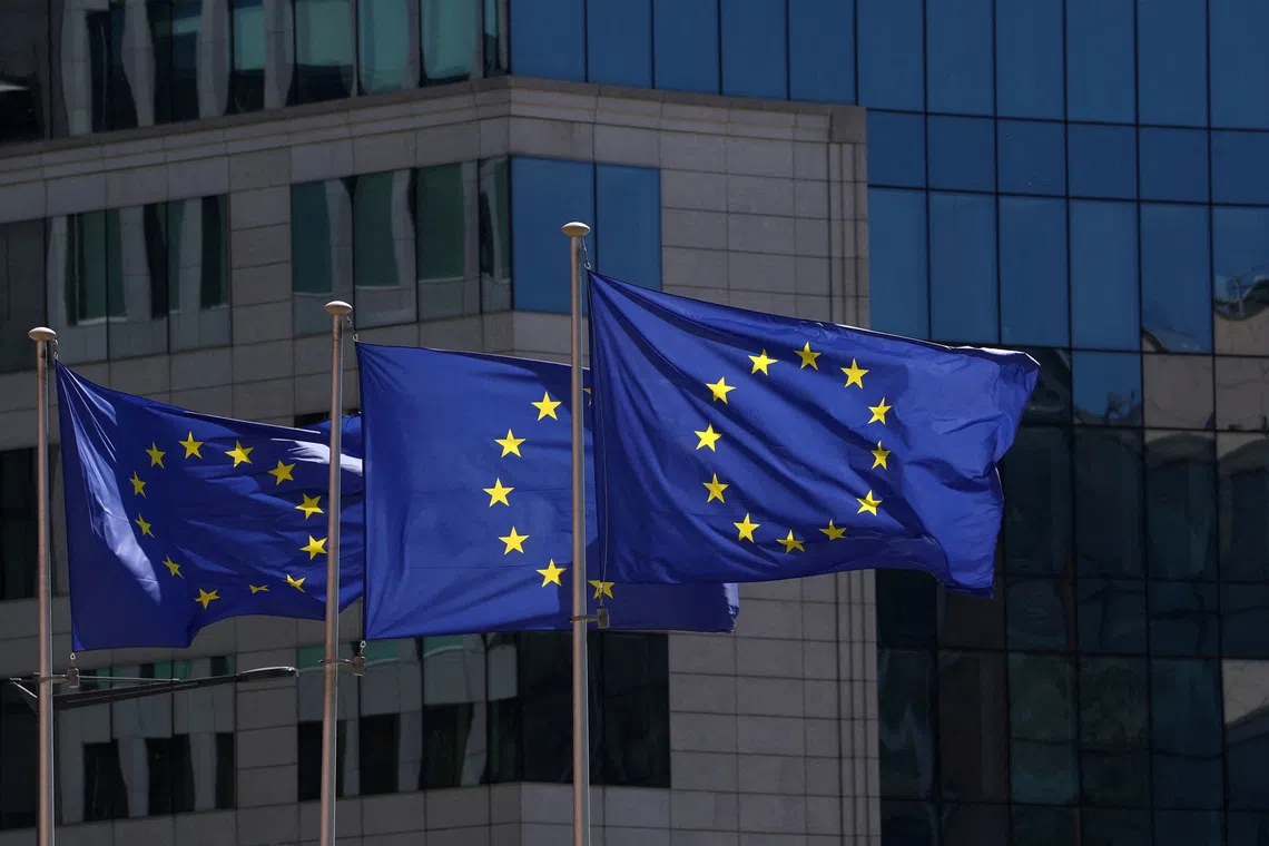 FILE PHOTO: European Union flags flutter outside the European Commission headquarters in Brussels, Belgium April 29, 2026. REUTERS/Yves Herman/File Photo